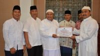 Syarfi Serahkan Dana Hibah Rp100 Juta ke Masjid AL-Hidayah 31 hibah 2