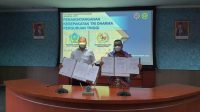 Bupati Taput Tandatangani Nota Kesepakatan Sinergi dengan Politeknik Transportasi Darat Indonesia-STTD Foto: Bupati Taput Nikson Nababan Tandatangani Nota Kesepakatan Sinergi antara Pemerintah Kabupaten Tapanuli Utara dan Politeknik Transportasi Darat Indonesia-STTD. (Istimewa)